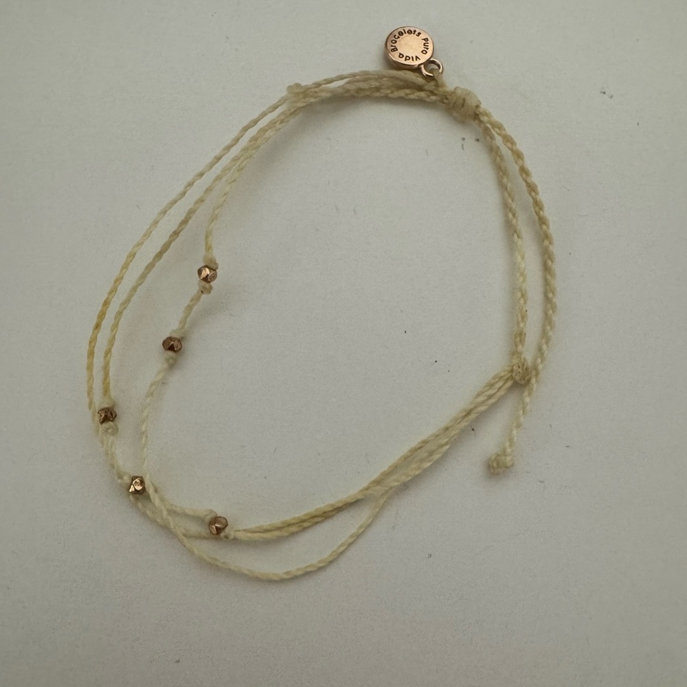 Gold and Cream Beaded Bracelet and Purple Bracelet